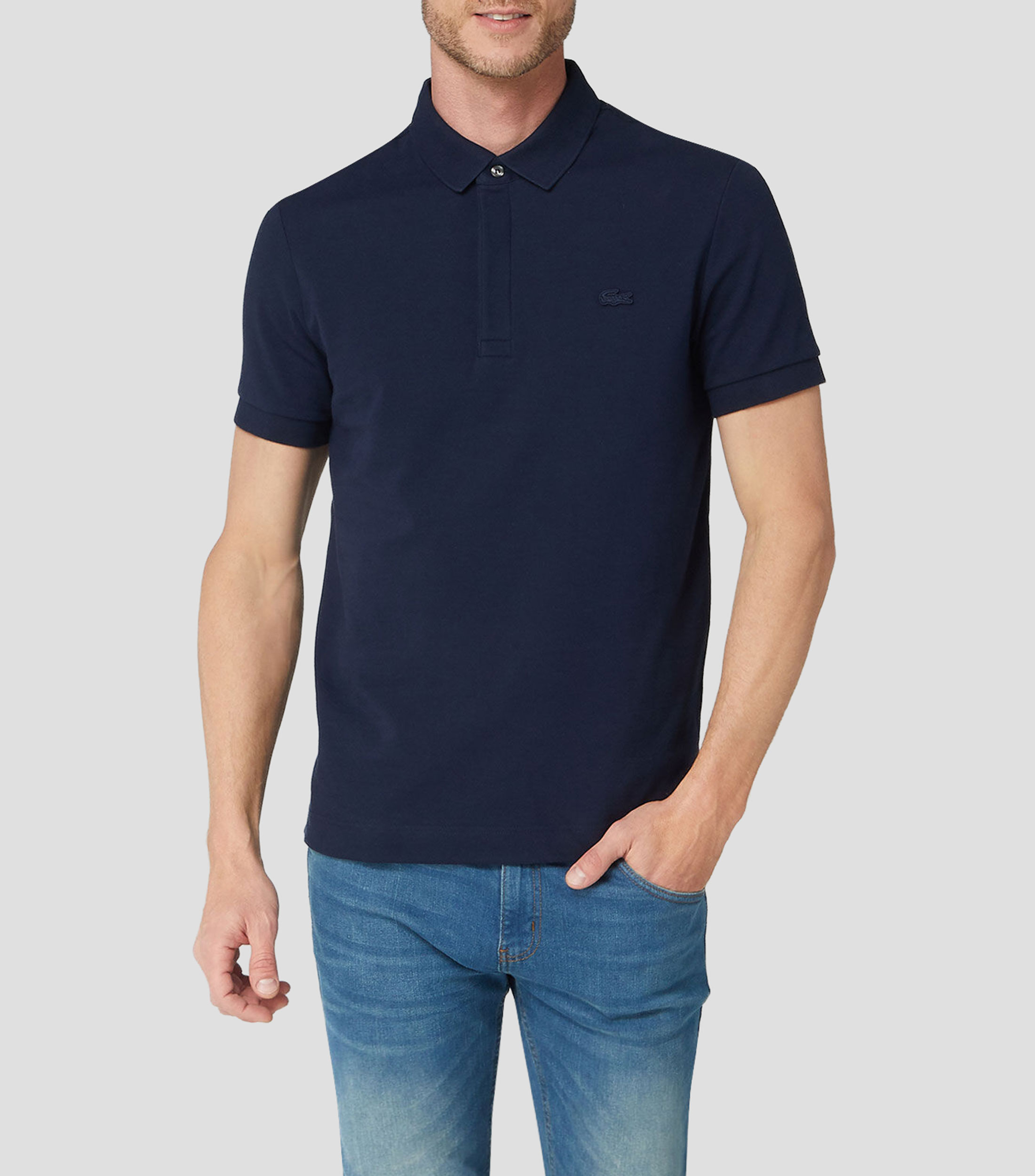 Playera tipo polo con manga corta lisa Hombre